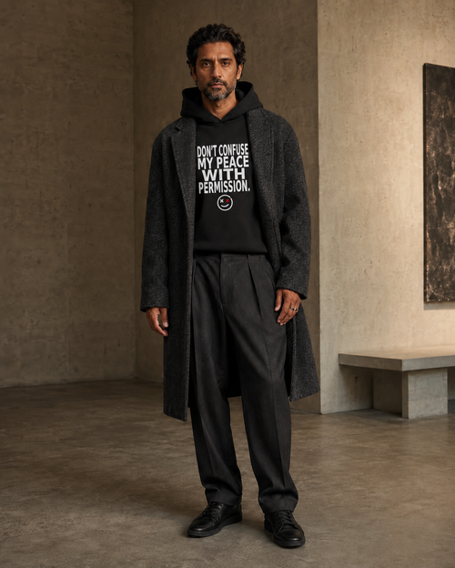 Don't Confuse My Peace With Permission black statement hoodie editorial mockup