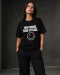 Model wearing a black personalized statement tee reading Your Words. Your Attitude.